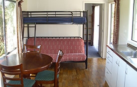 self-contained 1-bedroom cabin bunks